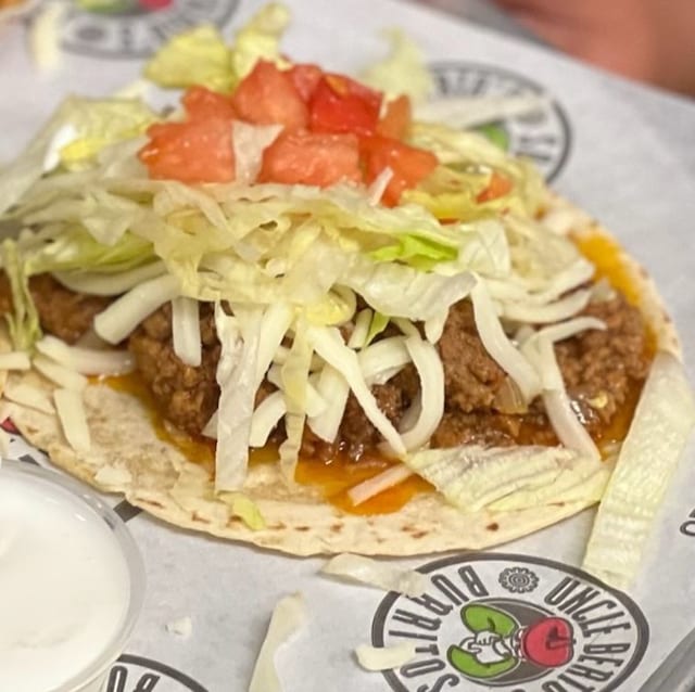 THREE SOFT BEEF TACOS CHIPS N BEANS.